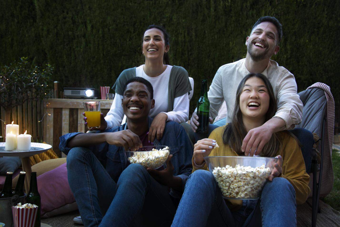 young-friends-having-fun-cinema-open-air (1)